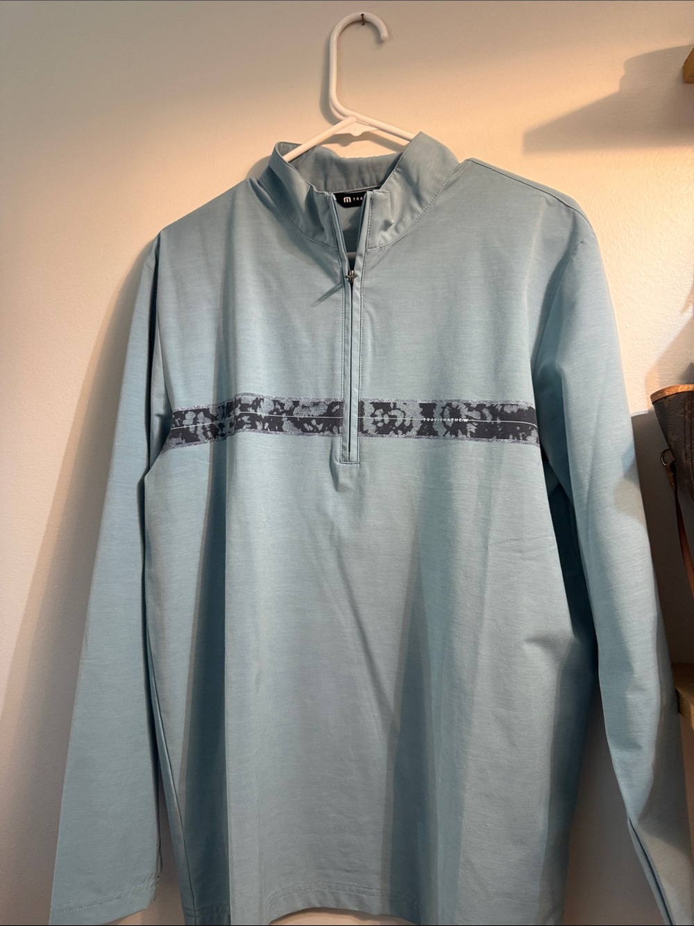 Travis Mathew Men's Light Blue Half-Zip with Navy Chest Stripe